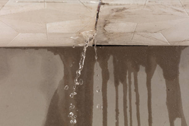 Professional Flood Damage Cleanup technician working in Onset, MA